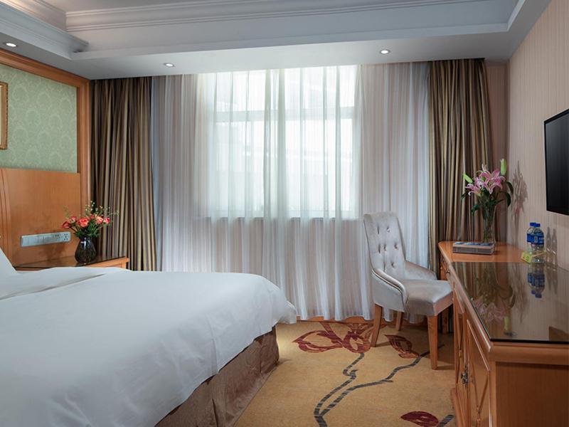 Vienna International Hotel Lijiang Yuxue Avenue Bagian luar foto